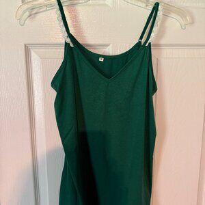 Green medium Tank top with white lace on shoulders.